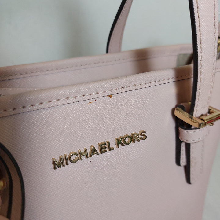 Pre-Loved Treasures - Michael Kors Light Pink Leather Small Jet Set Tote