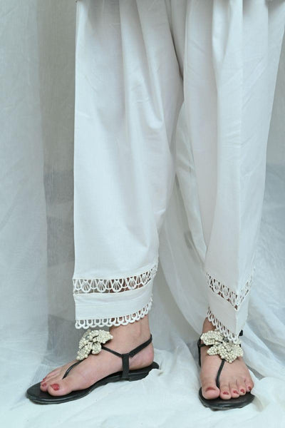 White Straight Pants With Lace Work On Flares | cotrasworld